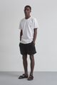23_10_ARM_NOVO_ECOMM_FB-DV6243_T-SHIRT-RJ-SOUVENIR-E-SHORT-GAVEA-PRETO